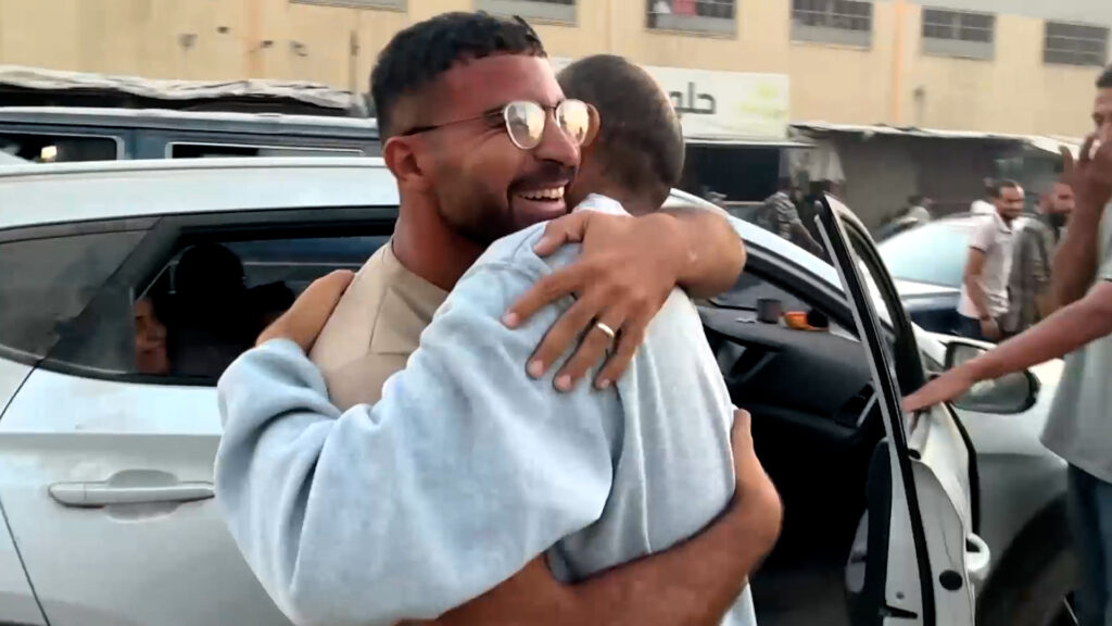 al-jazeera-reporter-reunited-with-his-brother-as-he’s-freed-by-israel