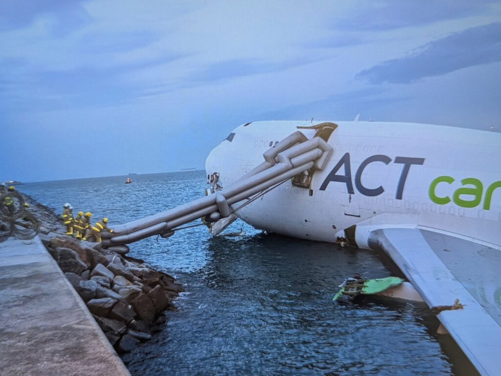 two-killed-as-cargo-plane-skids-off-hong-kong-runway