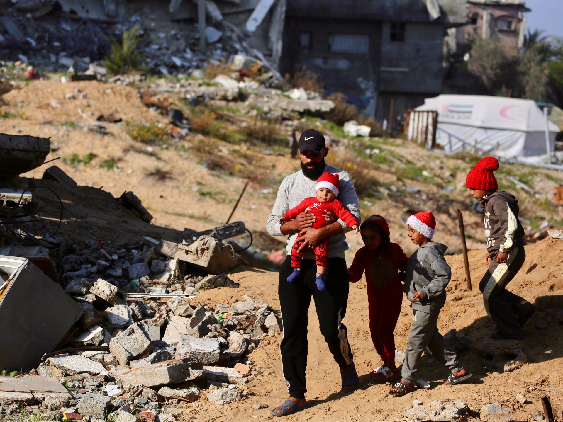 live:-sound-of-israel’s-bombs,-hum-of-drones-drown-out-christmas-in-gaza