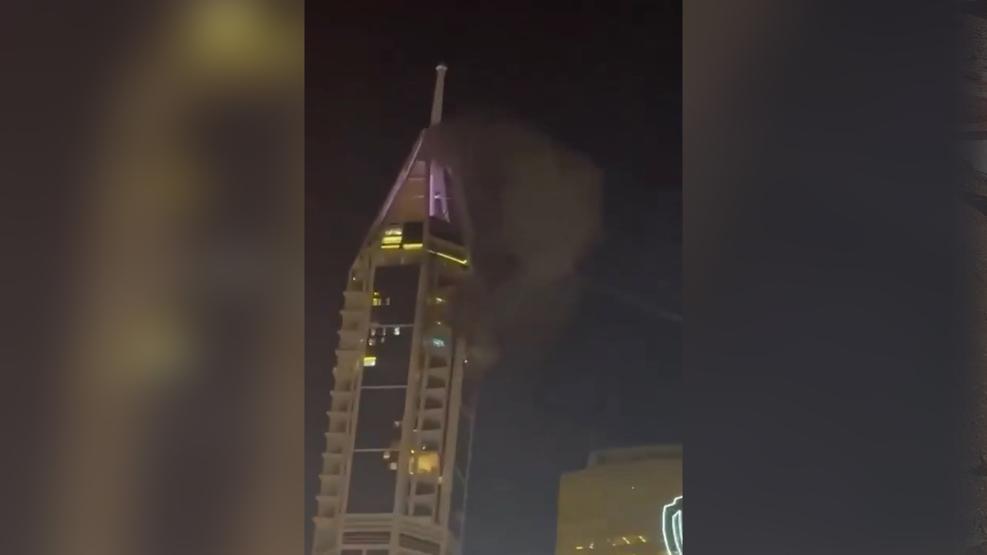 smoke-rises-from-a-dubai-tower-after-attack