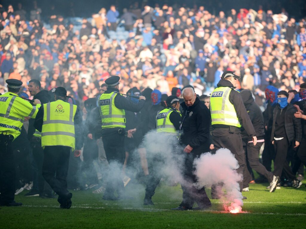 rangers-vs-celtic-turns-ugly-as-fans-clash-on-pitch-after-scottish-cup-tie