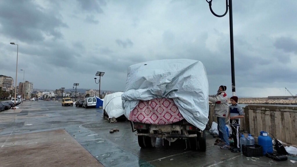 displaced-families-in-lebanon-turn-vehicles-into-rain-soaked-shelters