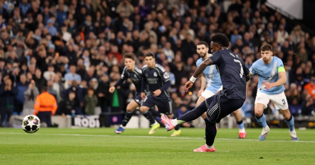 vinicius-jr-scores-twice-as-real-madrid-knock-man-city-out-of-ucl-last-16