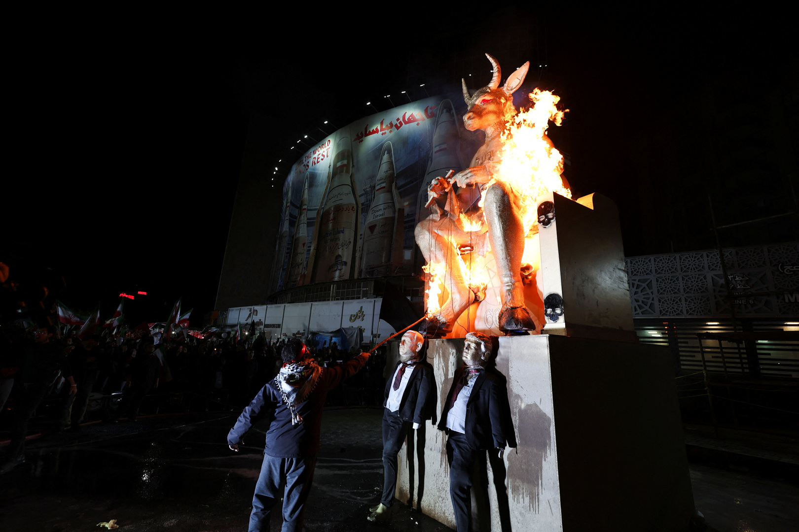 iranians-burn-trump,-netanyahu-effigies-at-warship-victim-rally