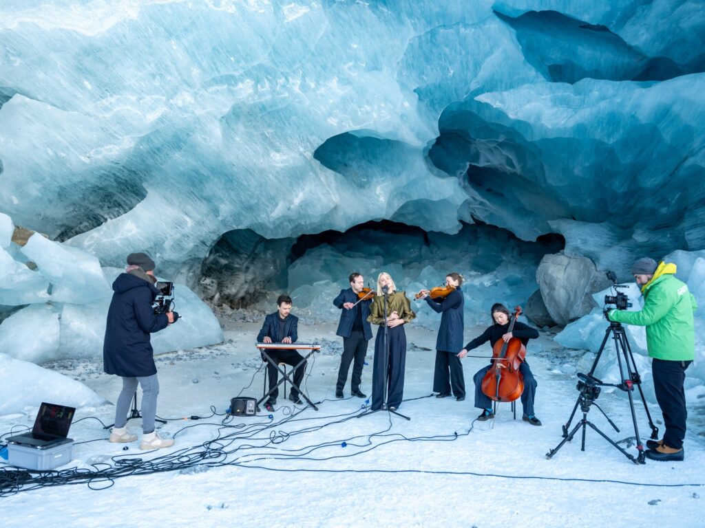 musician-performs-inside-melting-glacier-to-highlight-climate-crisis