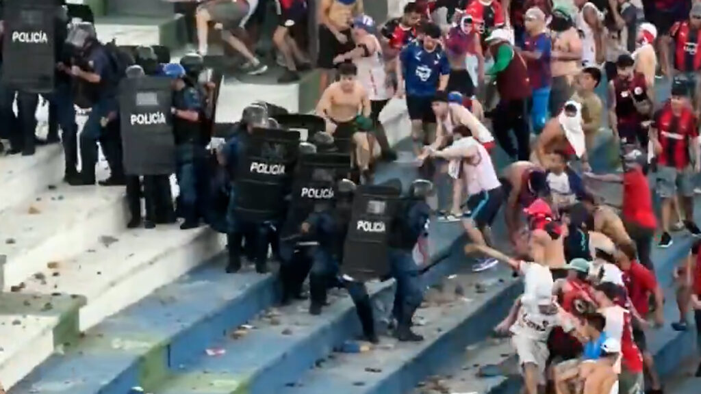 fans-fight-police-at-paraguay-football-match