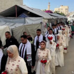 mass-wedding-brings-brief-joy-to-couples-in-devastated-gaza
