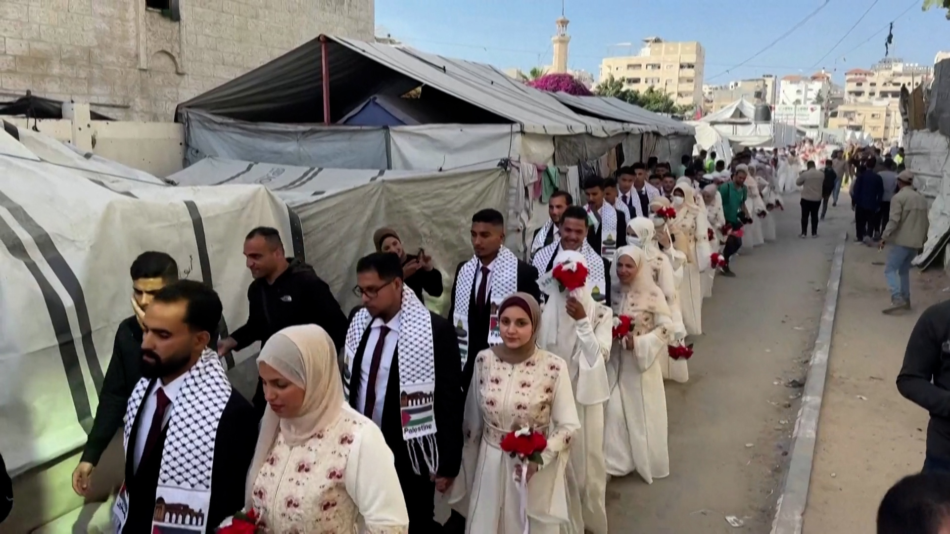 mass-wedding-brings-brief-joy-to-couples-in-devastated-gaza