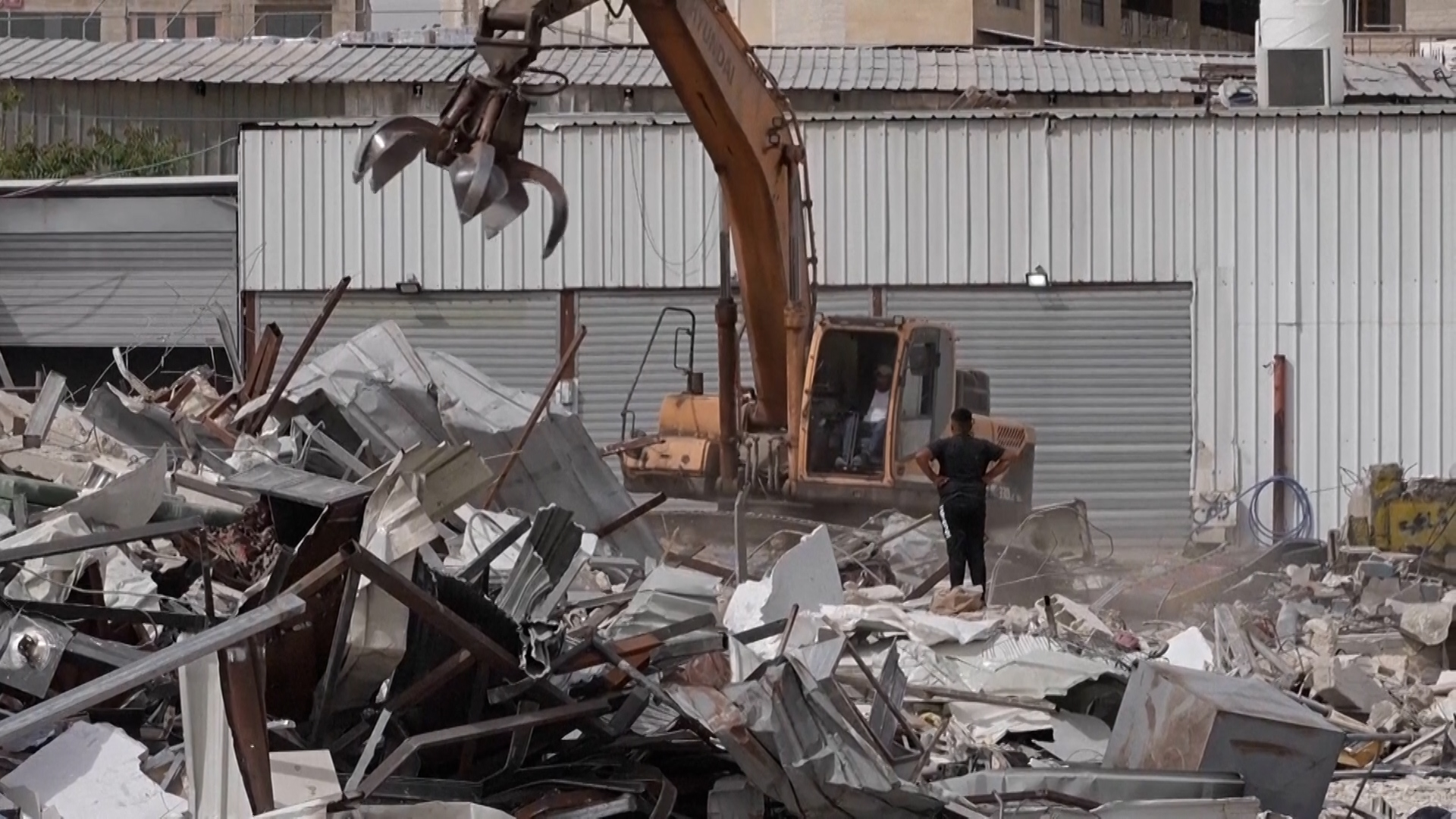 israel-bulldozes-palestinian-shops-to-make-way-for-settlement-linked-road