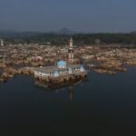 submerged-indonesian-village-re-emerges-as-drought-lowers-water-levels